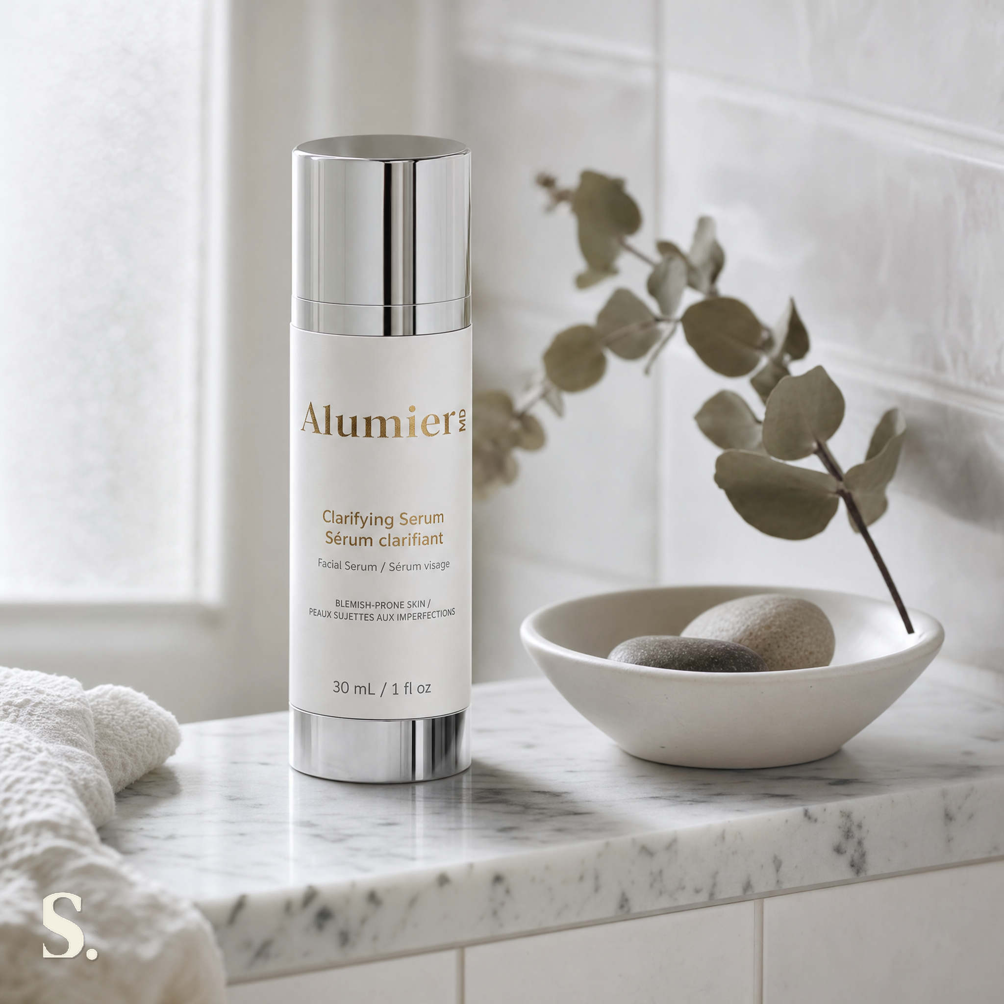AlumierMD Clarifying Serum in a lifestyle bathroom setting — Skintique review