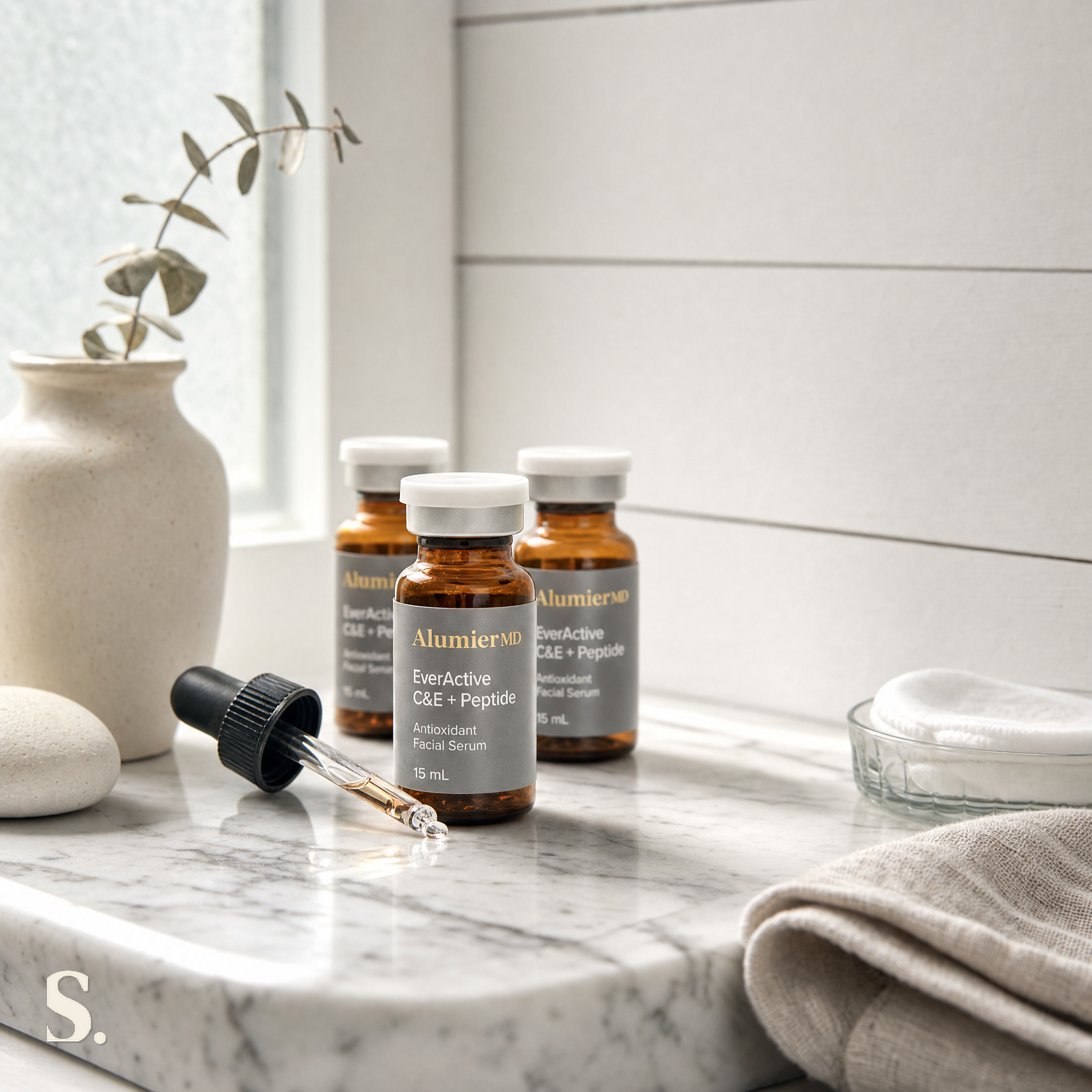 AlumierMD EverActive C&E + Peptide, in a lifestyle bathroom setting — Skintique review