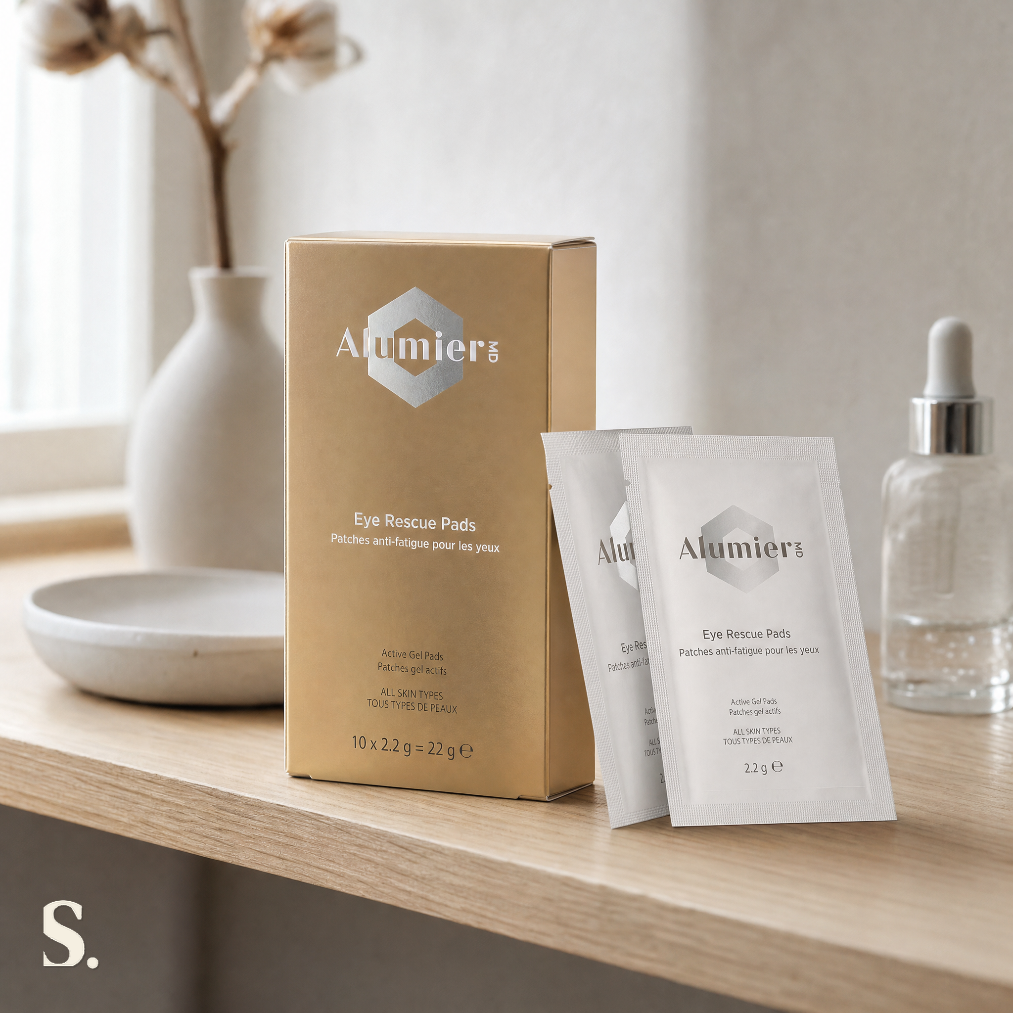 AlumierMD Eye Rescue Pads in a lifestyle bathroom setting — Skintique review
