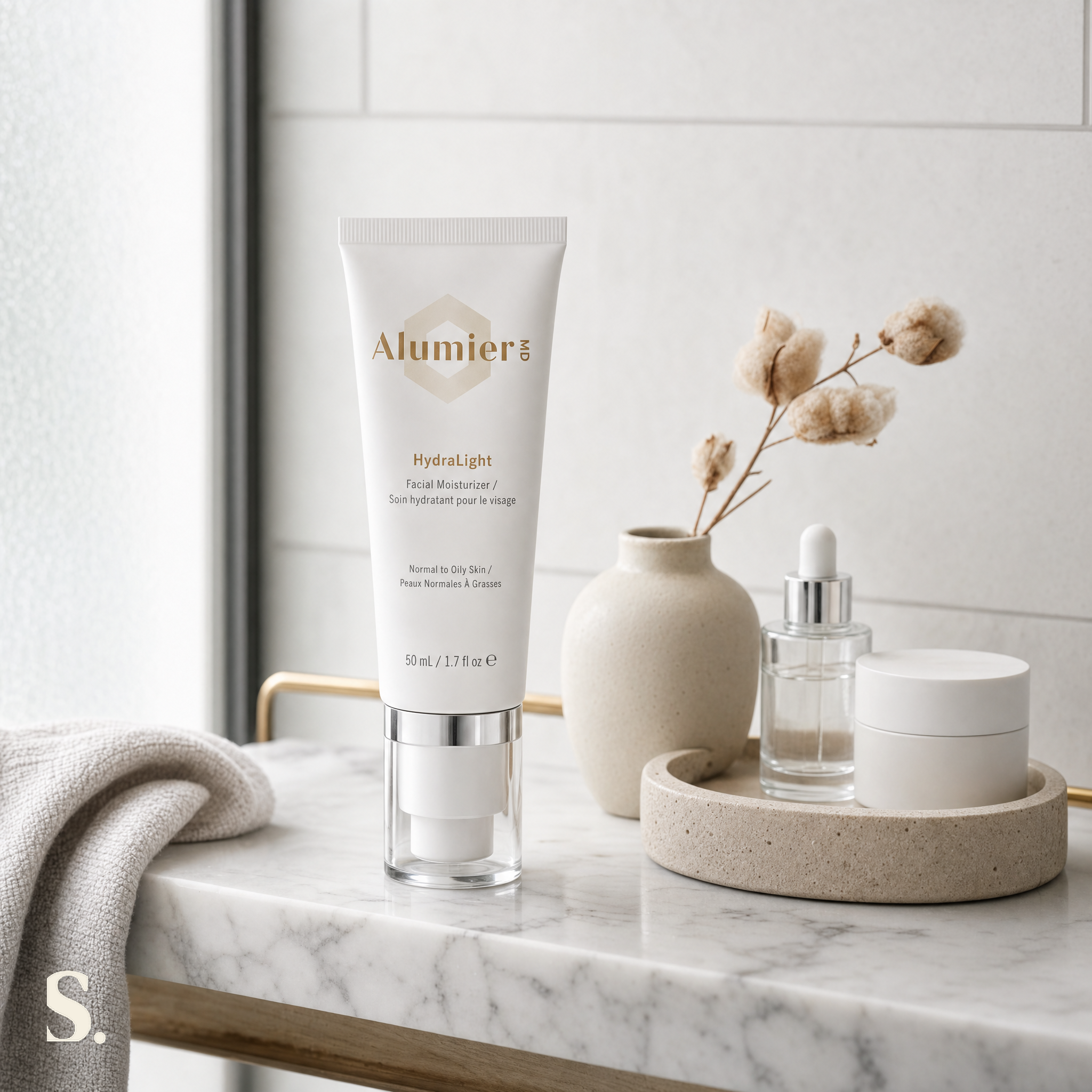 AlumierMD HydraLight Moisturiser in a lifestyle bathroom setting — Skintique review