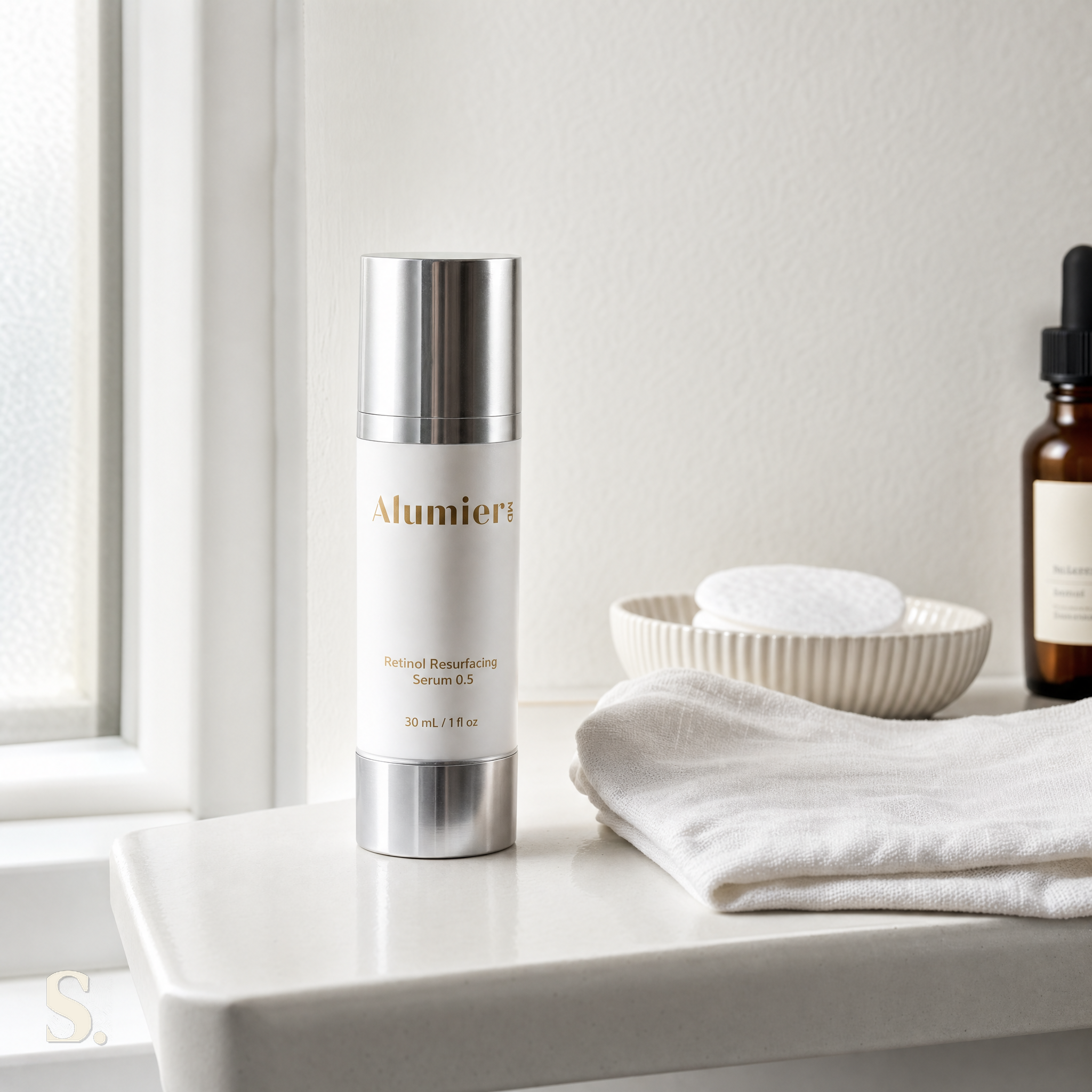 AlumierMD Retinol Resurfacing Serum 0.5 in a lifestyle bathroom setting — Skintique review