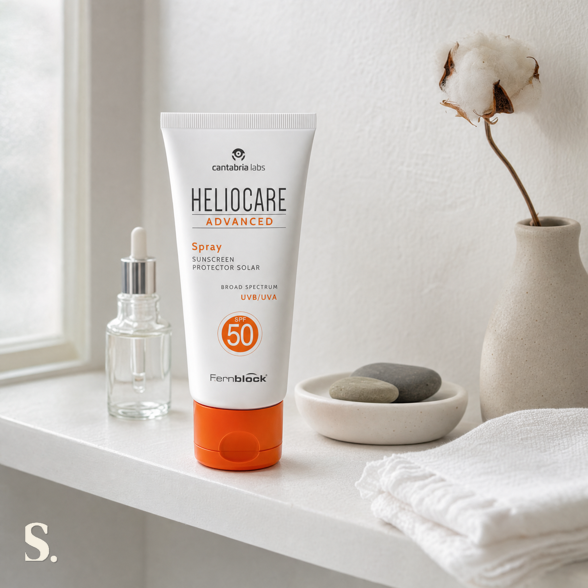 Heliocare Advanced Spray SPF50 in a lifestyle bathroom setting — Skintique review