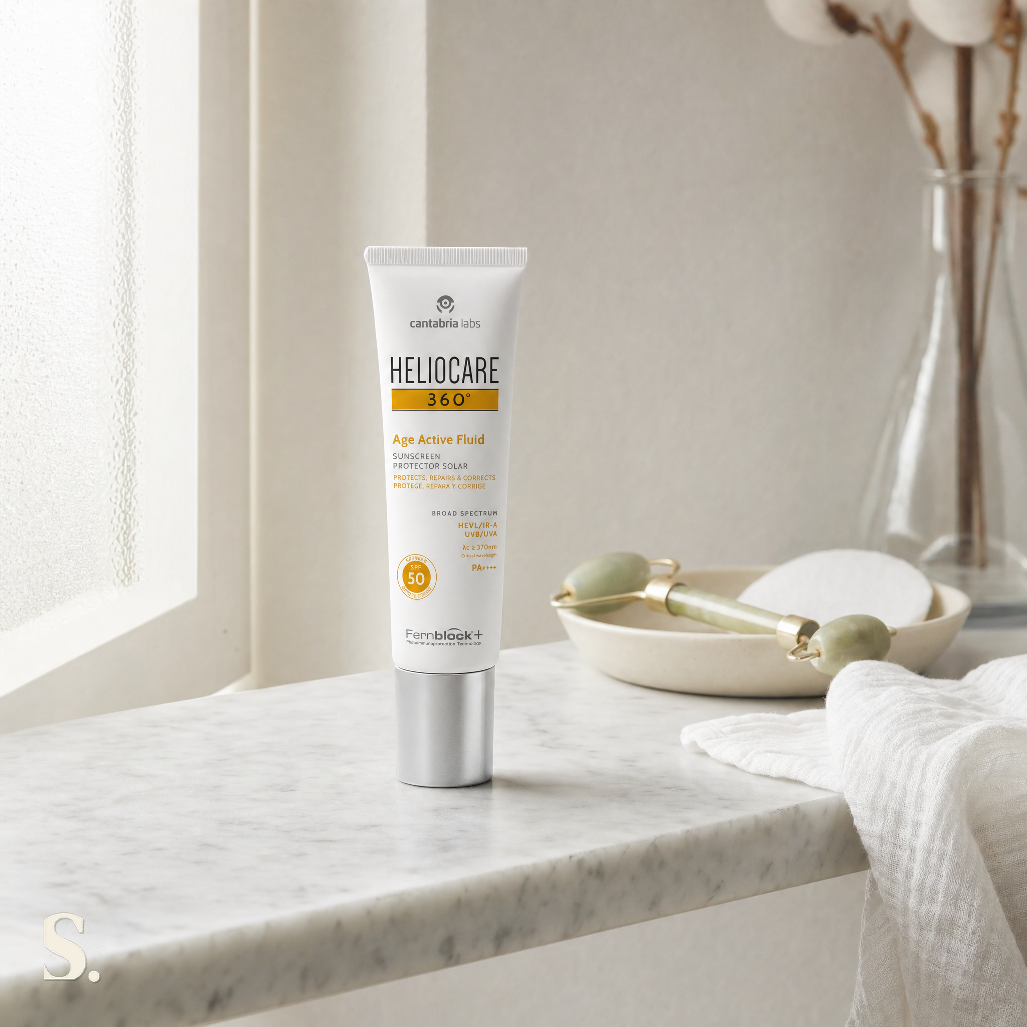Heliocare 360 Age Active Fluid SPF50 in a lifestyle bathroom setting — Skintique review