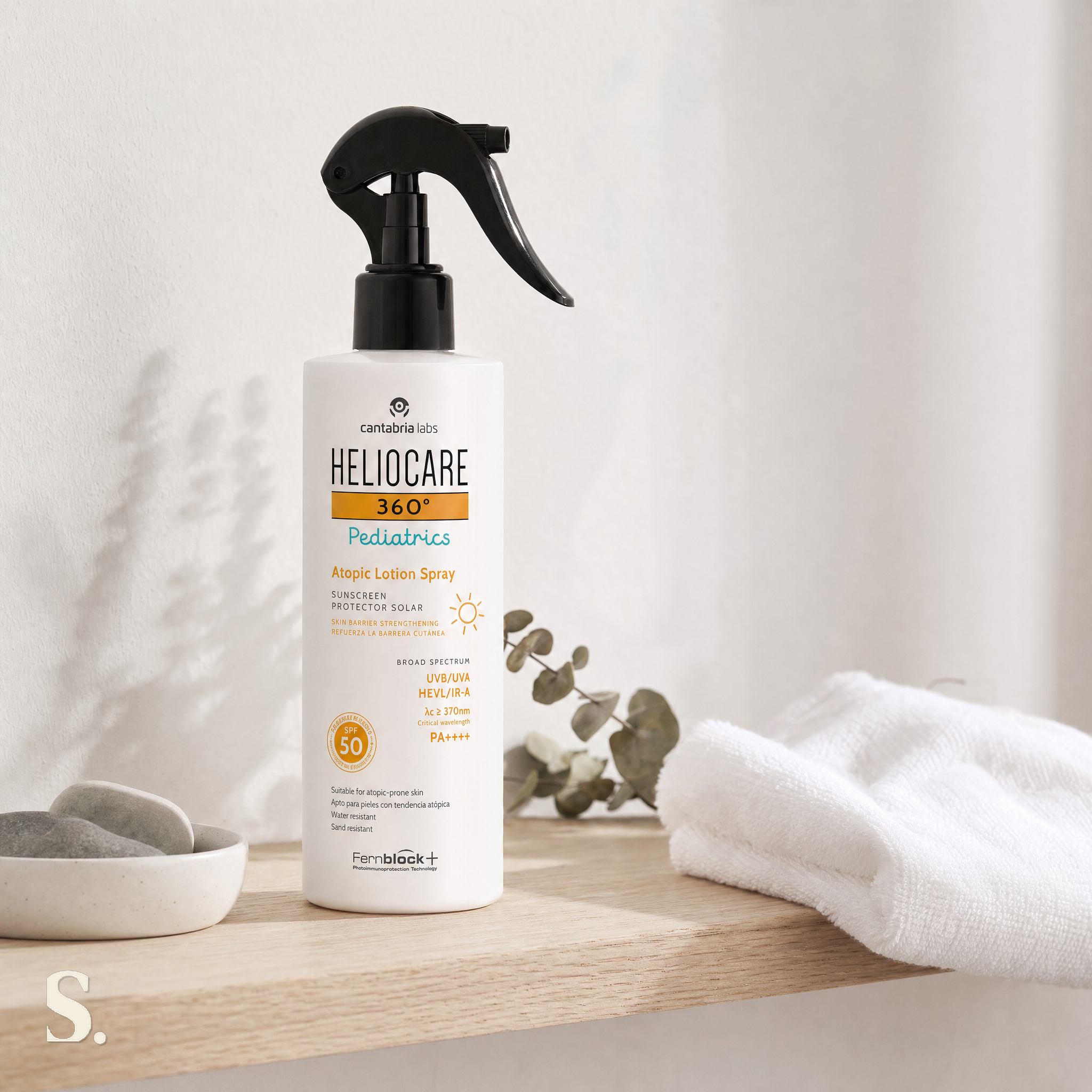 Heliocare 360° Pediatrics Lotion Spray SPF50 in a lifestyle bathroom setting — Skintique review