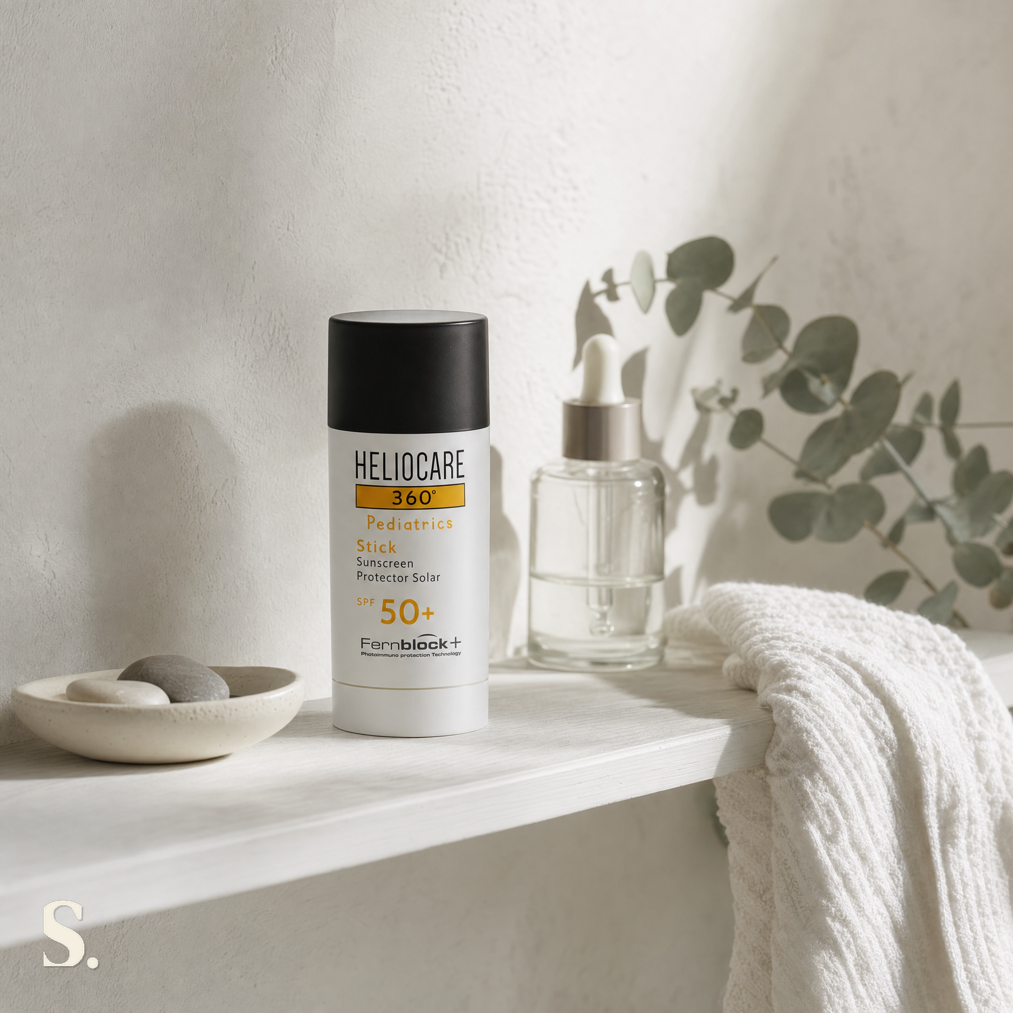 Heliocare 360° Pediatrics Stick SPF50+ in a lifestyle bathroom setting — Skintique review