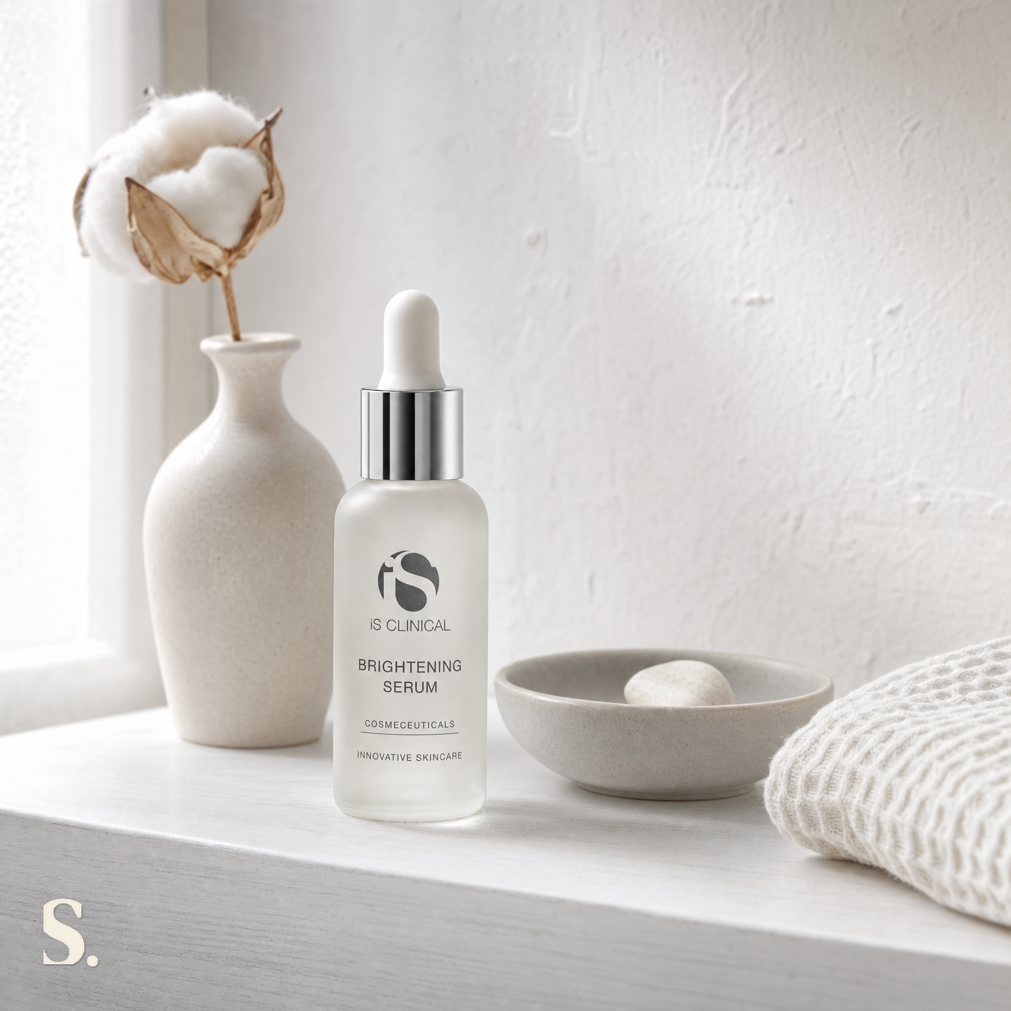 iS Clinical Brightening Serum in a lifestyle bathroom setting — Skintique review