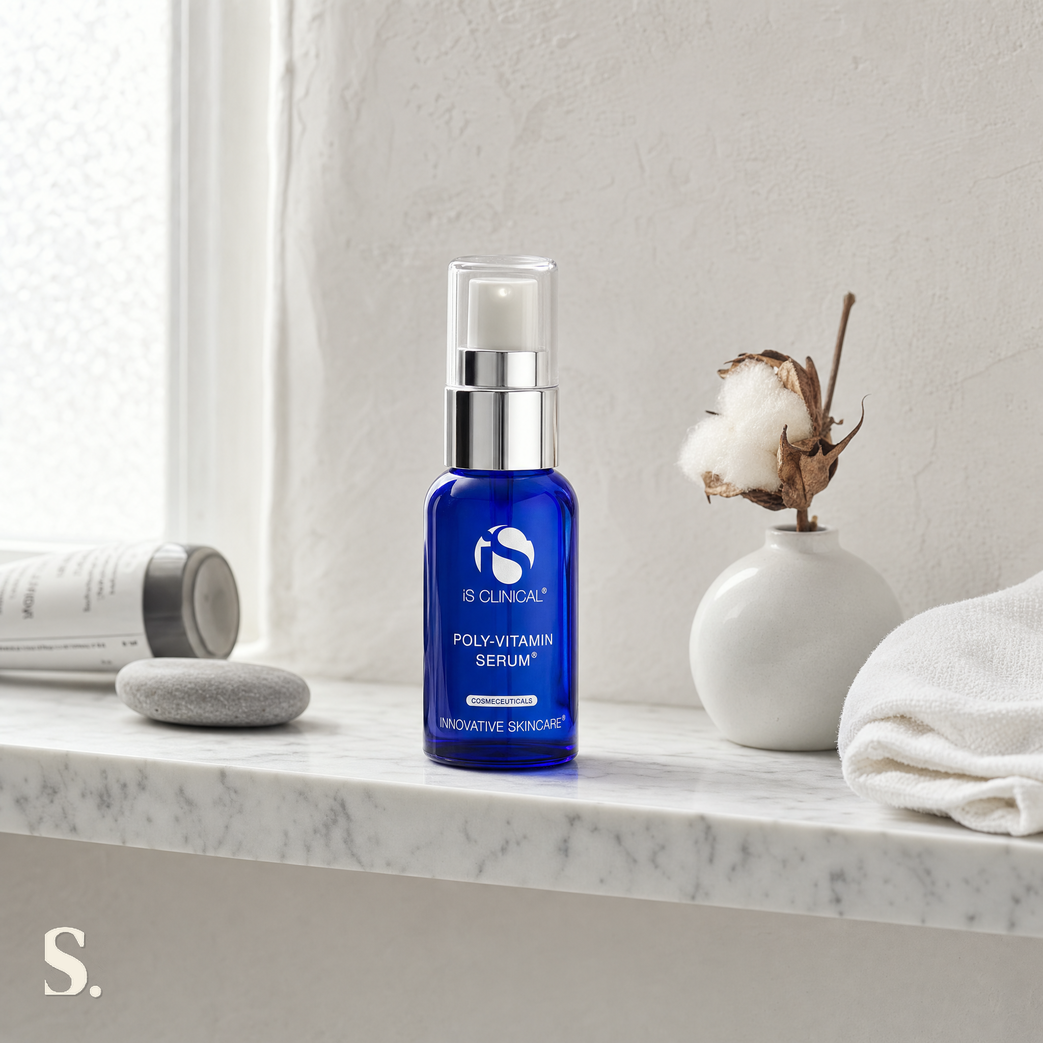 iS Clinical Poly-Vitamin Serum in a lifestyle bathroom setting — Skintique review