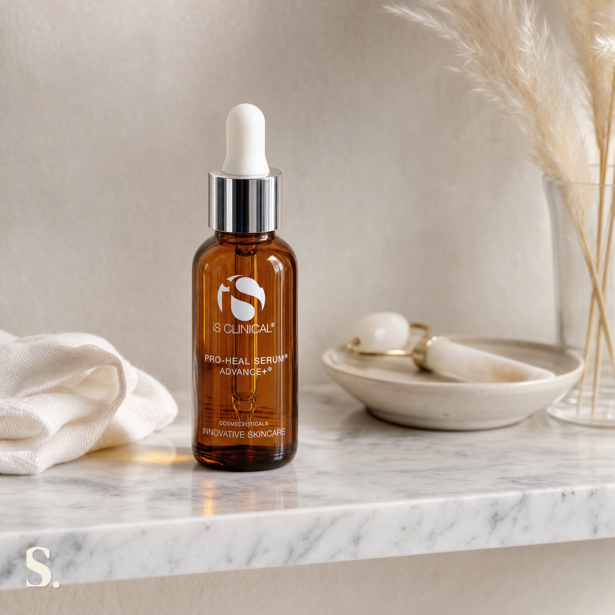 iS Clinical Pro-Heal Serum Advance+ in a lifestyle bathroom setting — Skintique review