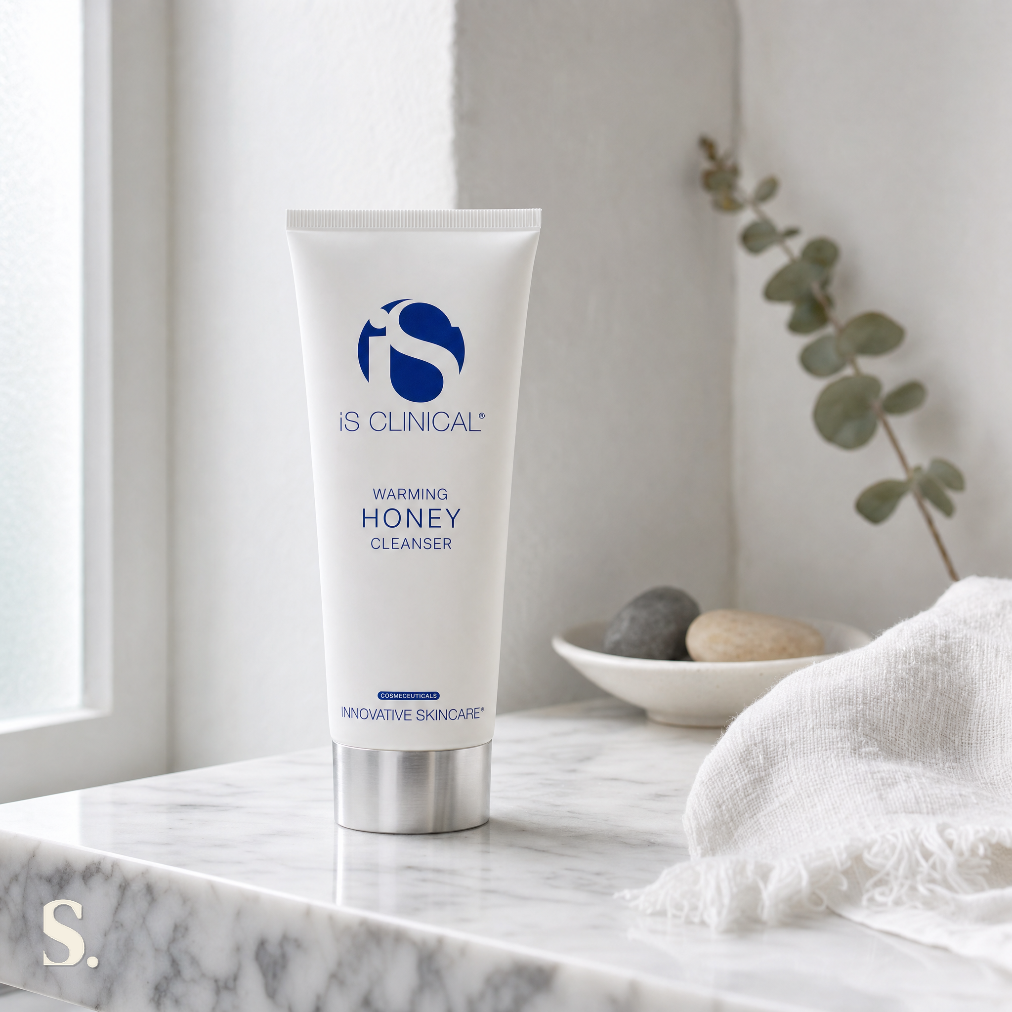 iS Clinical Warming Honey Cleanser in a lifestyle bathroom setting — Skintique review