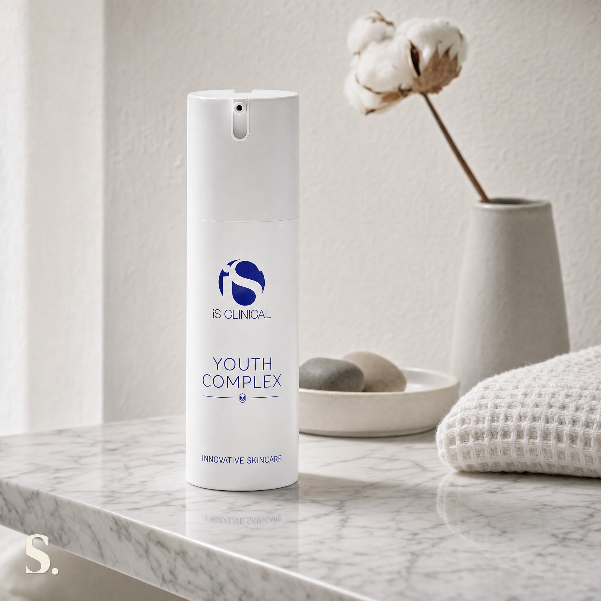 iS Clinical Youth Complex in a lifestyle bathroom setting — Skintique review