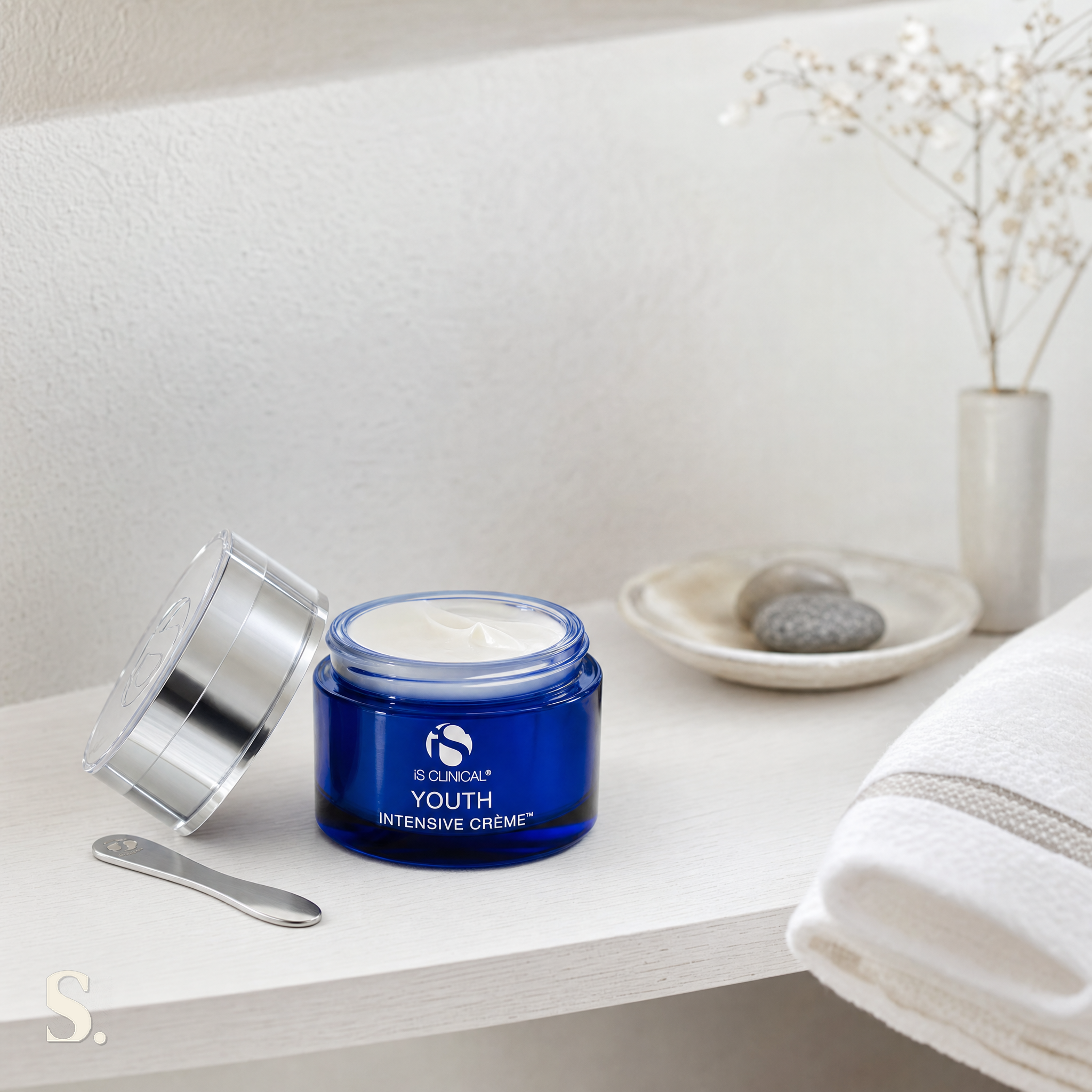 iS Clinical Youth Intensive Creme in a lifestyle bathroom setting — Skintique review