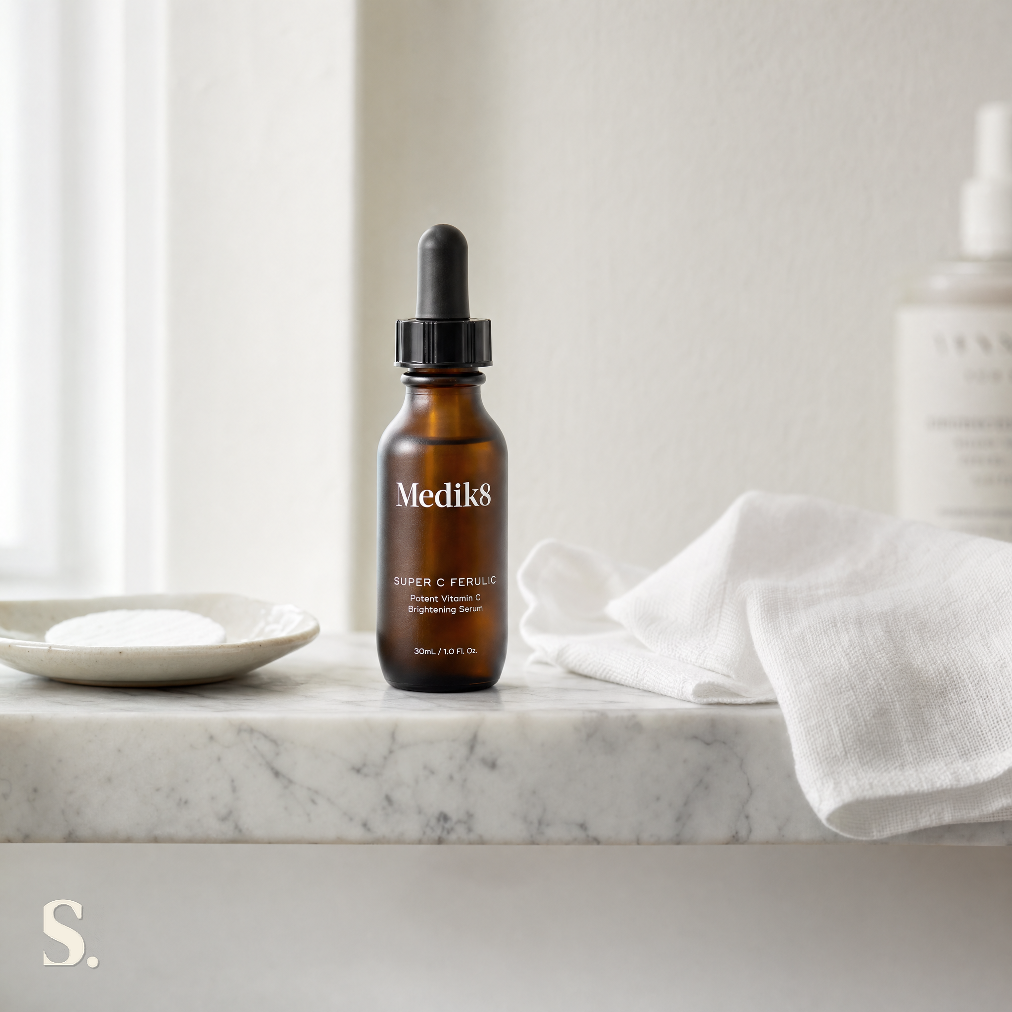 Medik8 Super C Ferulic in a lifestyle bathroom setting — Skintique review