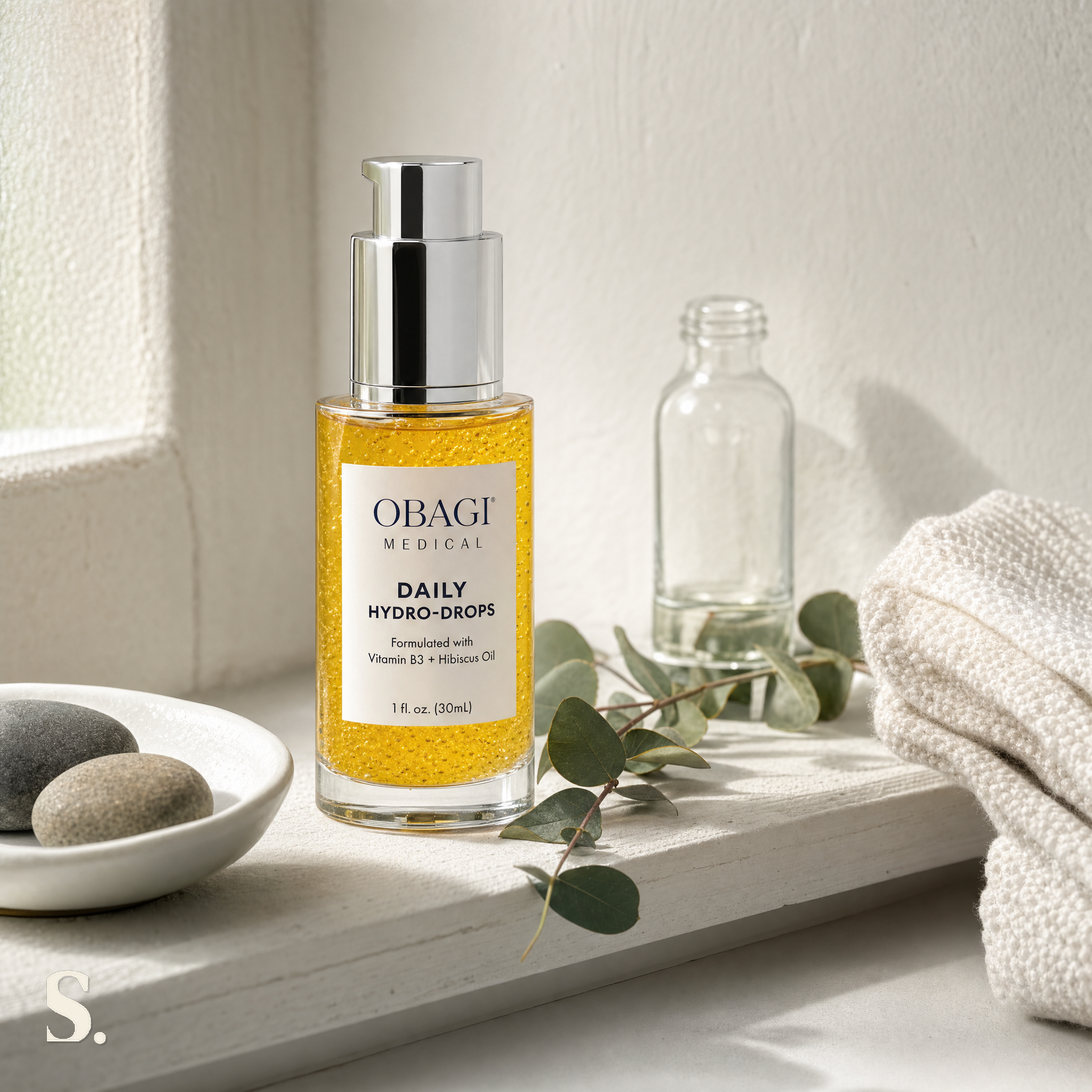 Obagi Daily Hydro-Drops Facial Serum in a lifestyle bathroom setting — Skintique review