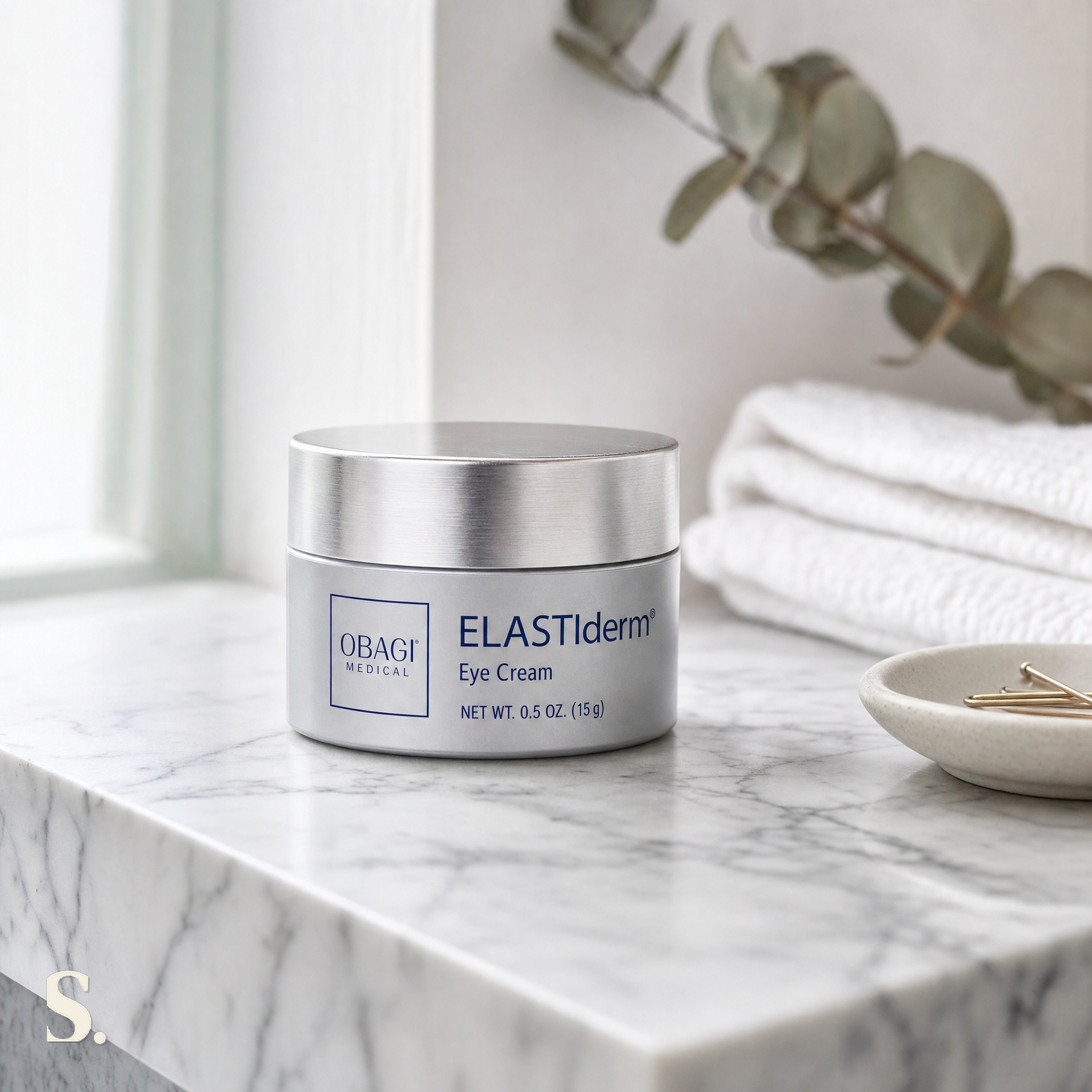 Obagi ELASTIderm Eye Cream in a lifestyle bathroom setting — Skintique review