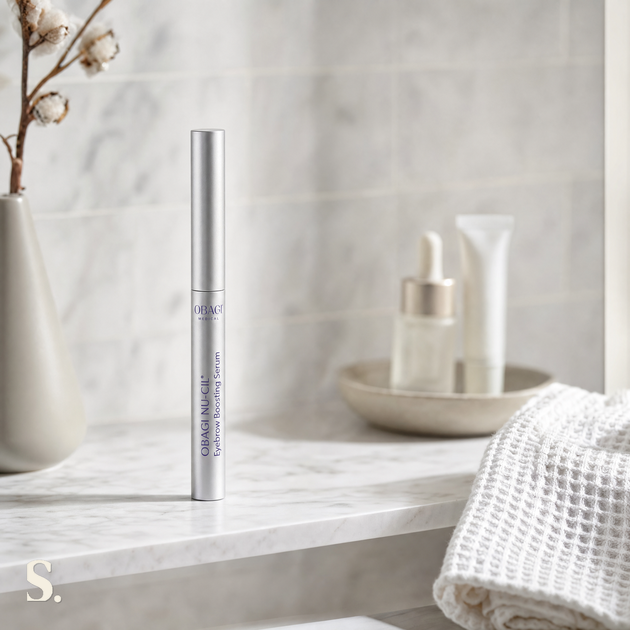 Obagi Nu-Cil Eyebrow Boosting Serum in a lifestyle bathroom setting — Skintique review
