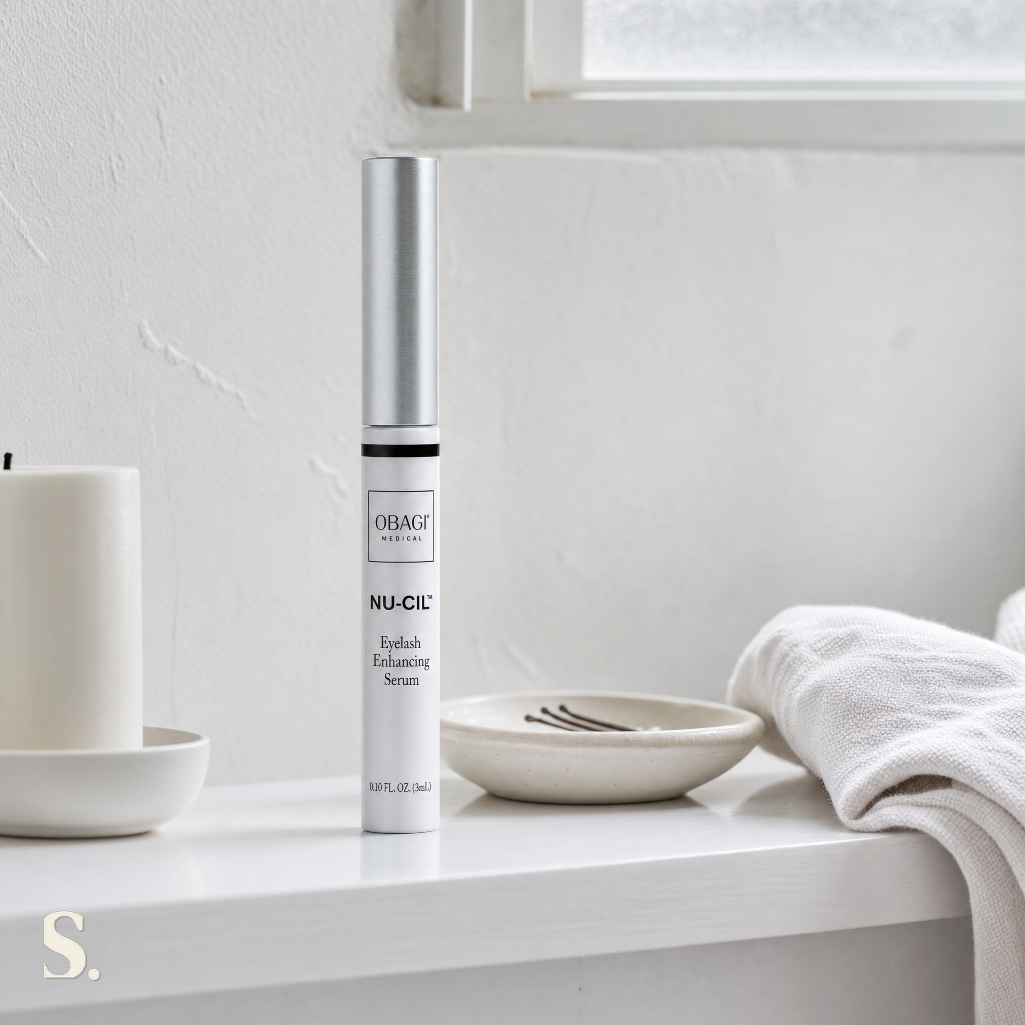Obagi Nu-Cil Eyelash Enhancing Serum in a lifestyle bathroom setting — Skintique review