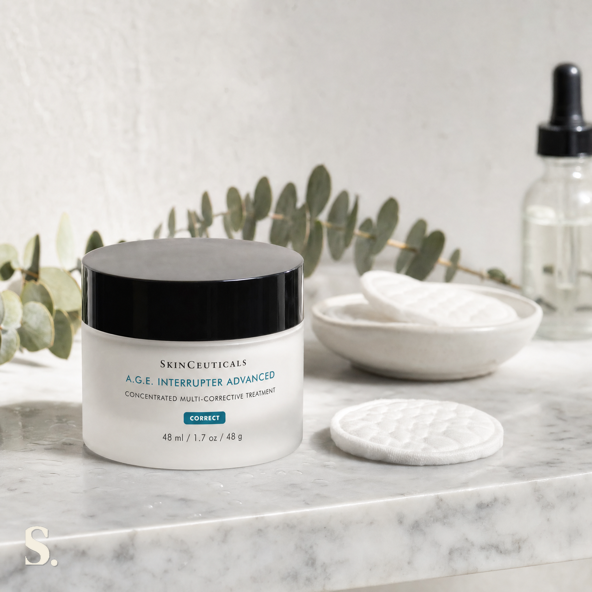 SkinCeuticals A.G.E. Interrupter Advanced in a lifestyle bathroom setting — Skintique review