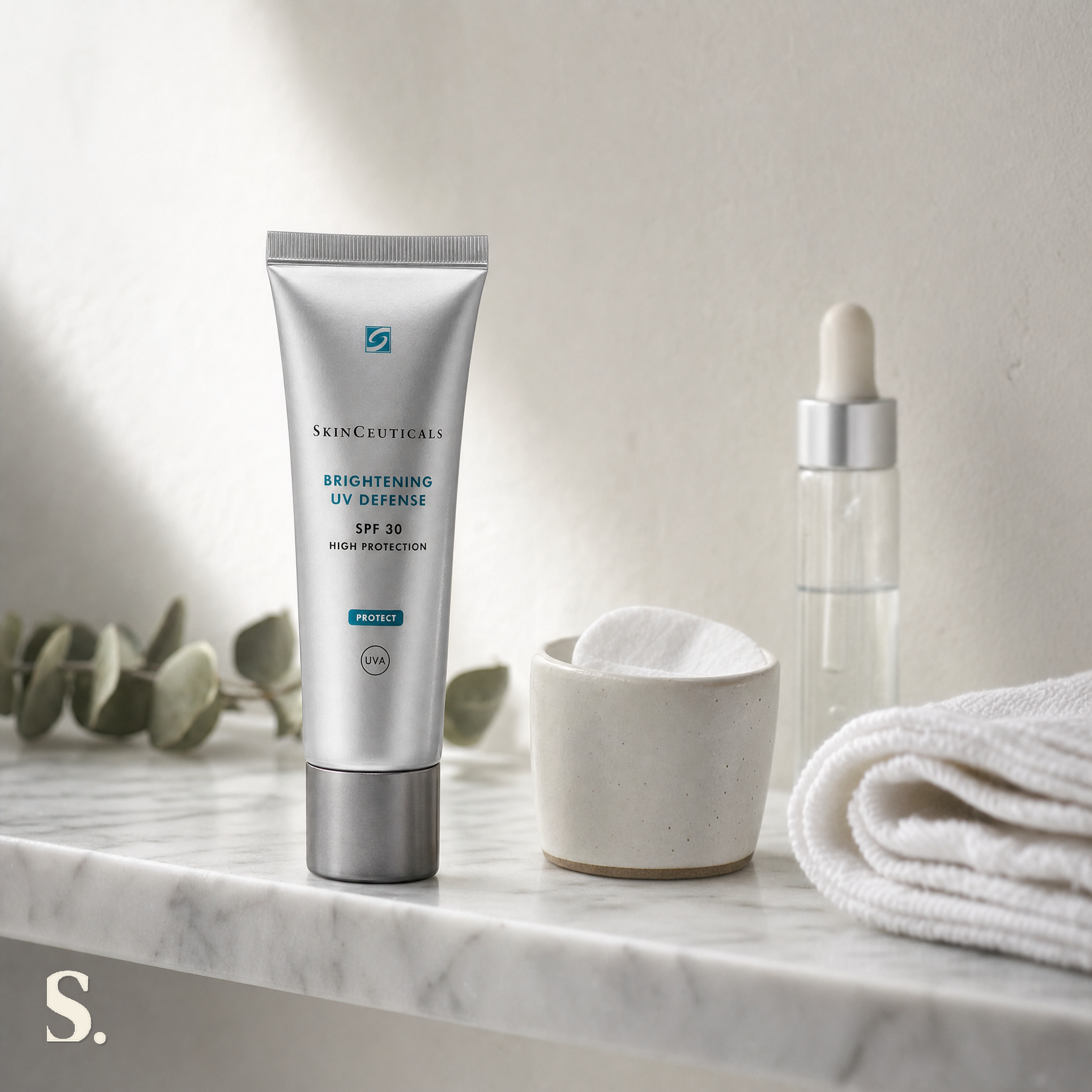 SkinCeuticals Brightening UV Defense SPF30 in a lifestyle bathroom setting — Skintique review